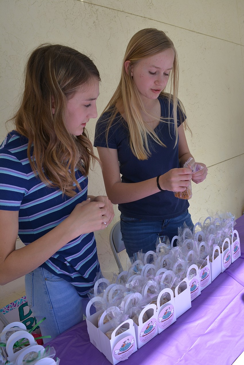 East County's Ava Thompsen and friend Ginger Matuszewski sold homemade dog treats.