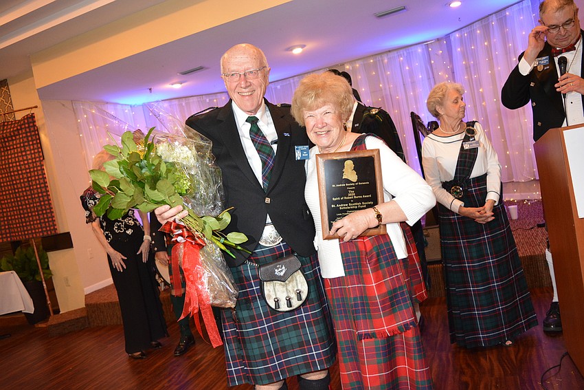 Saraota's Bert Mitchell and Linda Prowten received the 