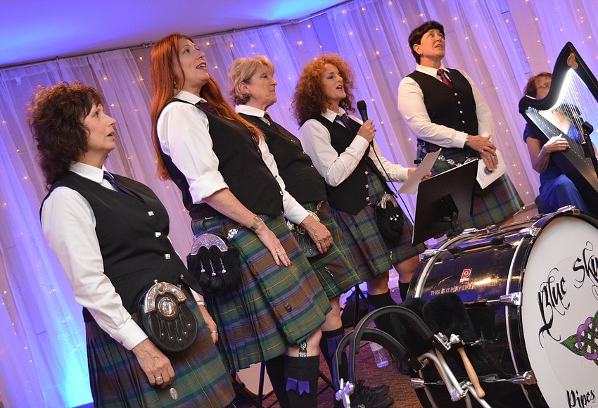 Your Observer Photo Blue Skye Pipes and Drums perform "Charlie is
