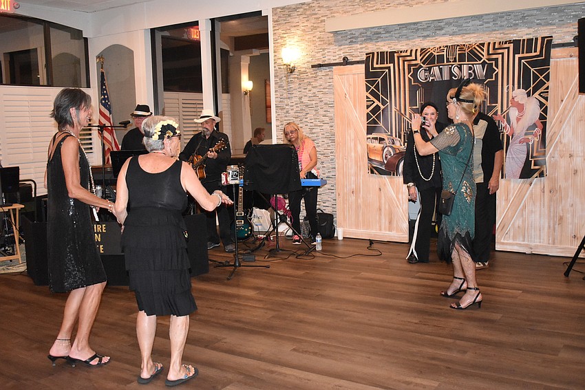 A few women started the dancing for the evening.