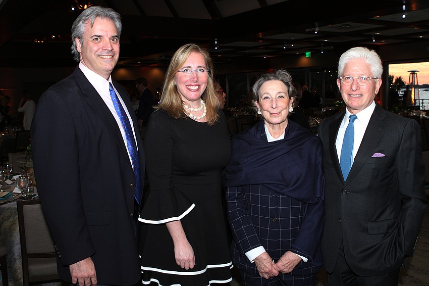 Rob and CEO and President Jennifer Rominiecki with James and Tina Snyder