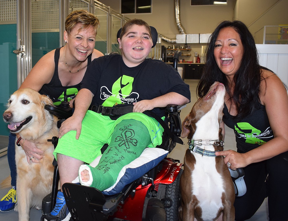 Monaka Oberer and Rebekah Boudrie join Grayson Tullio (center) at the Humane Society of Lakewood Ranch.