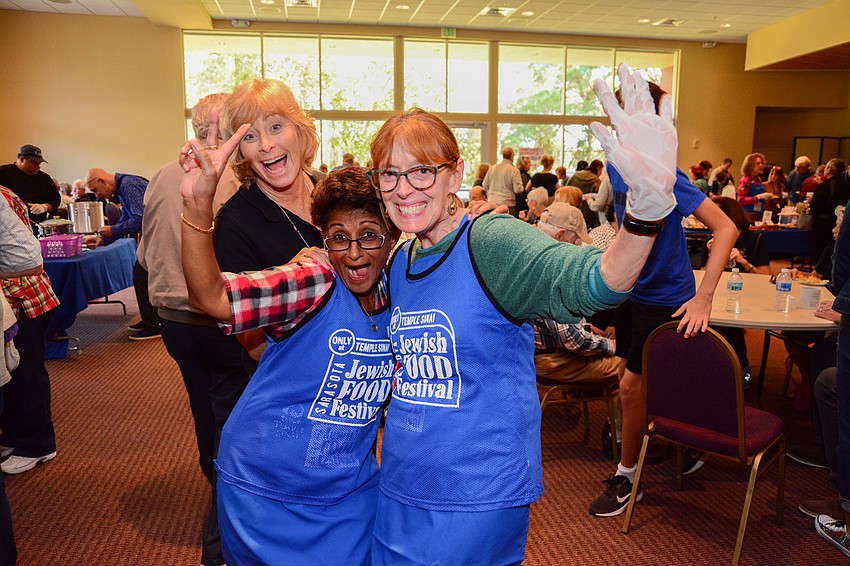 Patty Glah, left, coordinator of the Jewish Food Festival, with Varsha Stein and Barbara Scissors.