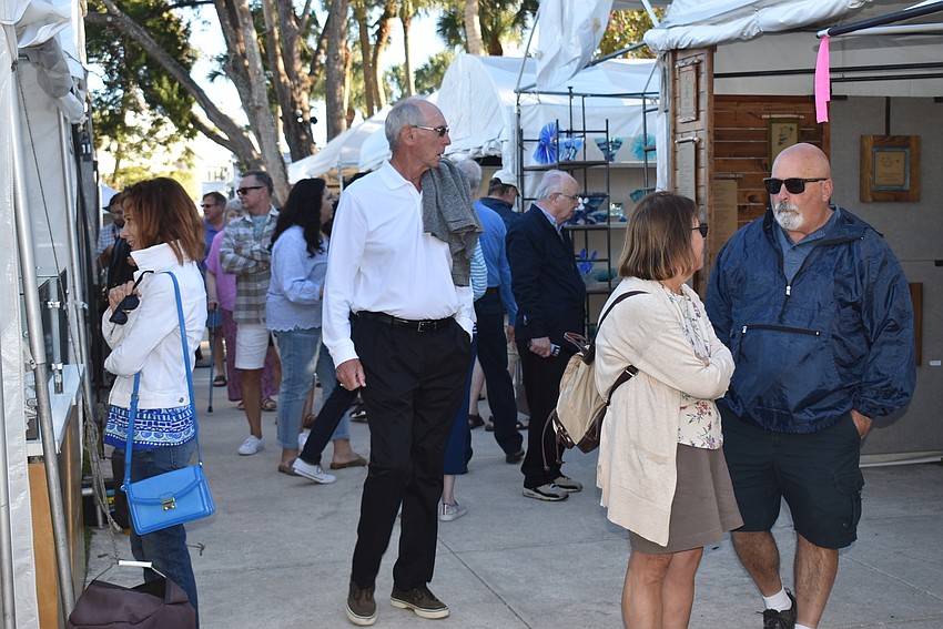 Attendees move slowly through the festival.