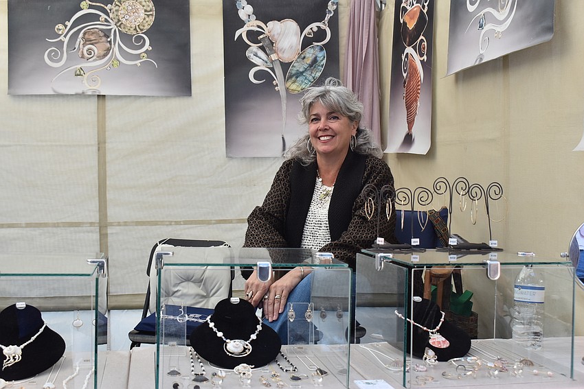 Barbara Umbel at her jewelry tent.