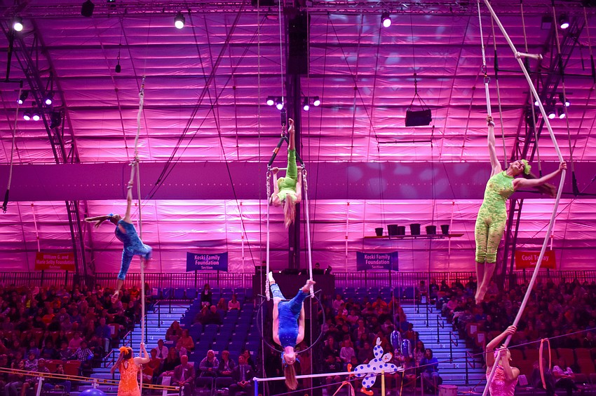 Students from the Sarasota High School circus magnet program perform on the aerial spinning rope.