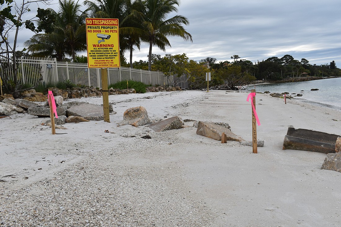 The homeowners removed the ropes that were blocking off the area, leaving stakes and rocks.
