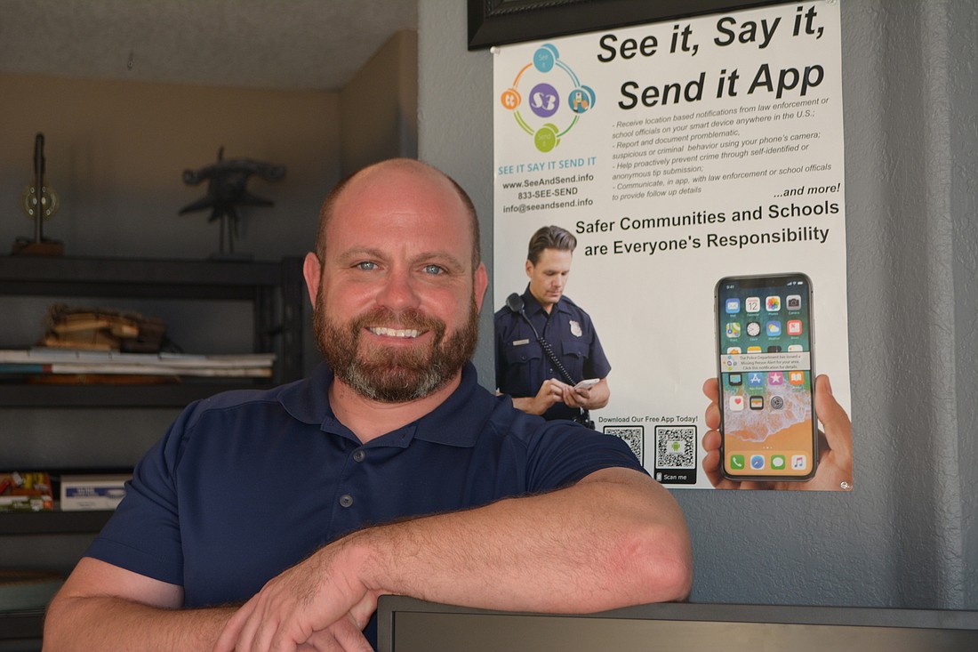 See It, Say It, Send It creator Kevin Angell stands in the app&#39;s new Sarasota office.