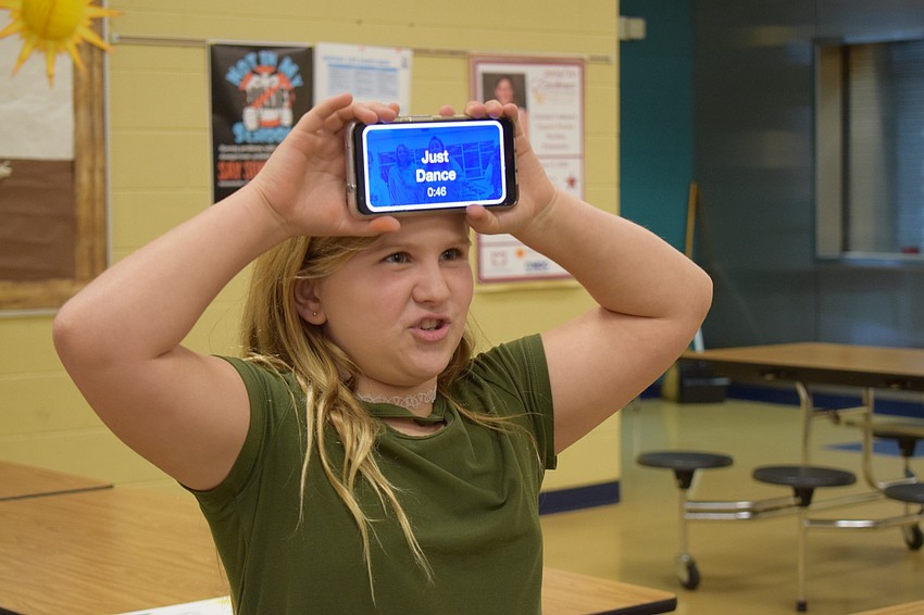 Abby Constanzer, a fifth grader, correctly guesses 