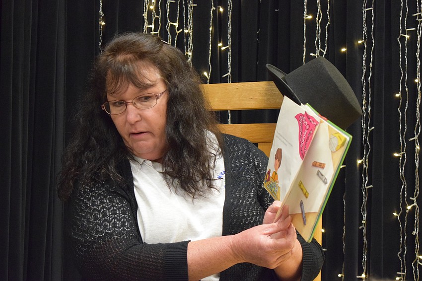 Joy Bauknight, a third grade teacher, reads 