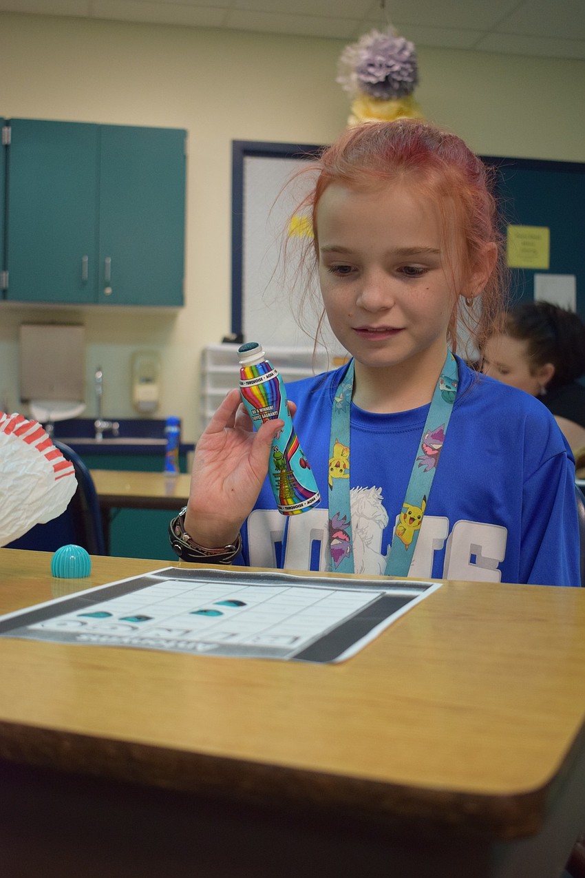 Bella Fincher, a sixth grader, plays word Bingo. Fincher went to Myakka City Elementary School.