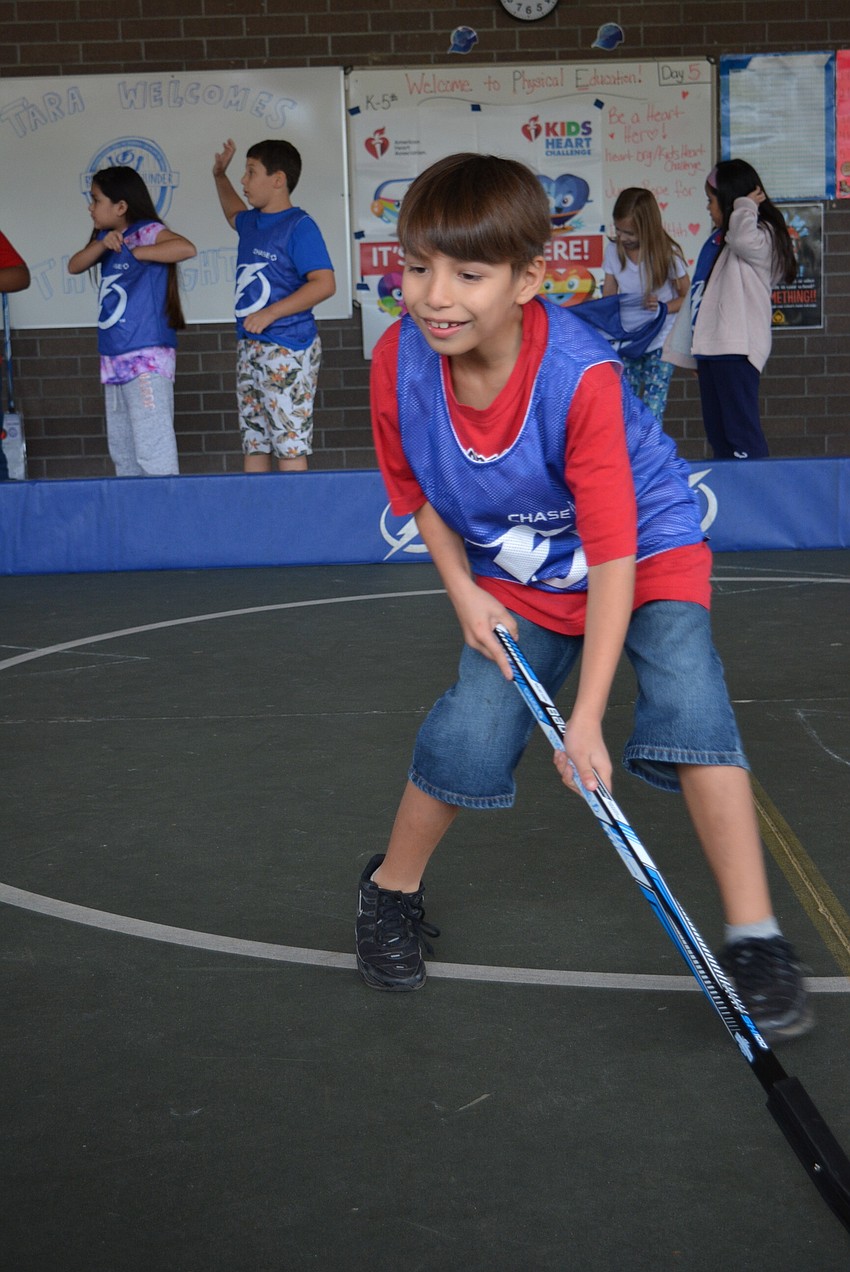 Third grader Daniel Guerra was all smiles as he played in multiple scrimmages.
