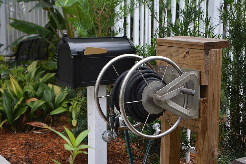 A mailbox and garden hose are located in the Rehabilitation Pavilion's mobility garden. Once they're cleared to go outside, patients can use gardening to practice their motor skills.