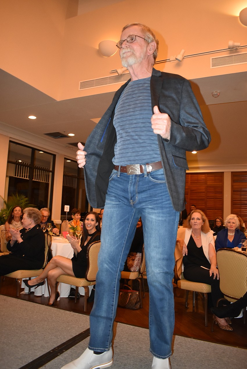 Rusty Chinnis shows off a jacket.