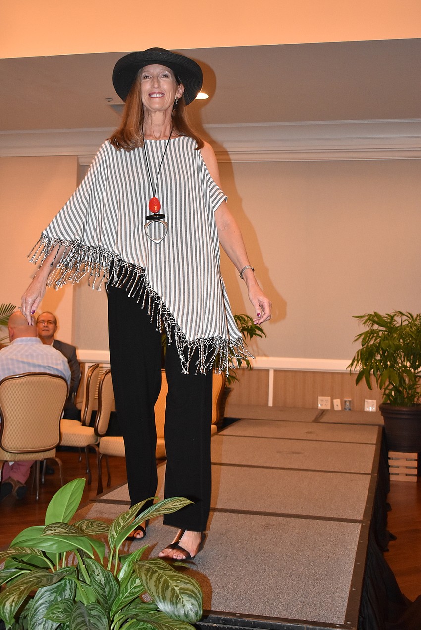 Cyndi Seamon strides down the runway.