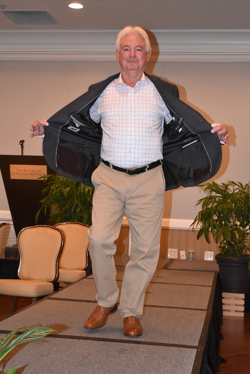 Jim Brown struts down the runway.