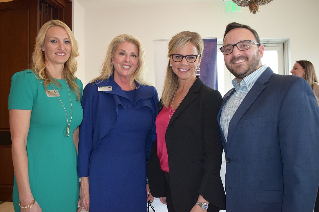 Past chair Heather Williams, new chair Lisa Kirkland, incoming chair 2021 Kristi Hoskinson and deputy chair Erik Hanson look forward to a year of continued success for the Lakewood Ranch Business Alliance.