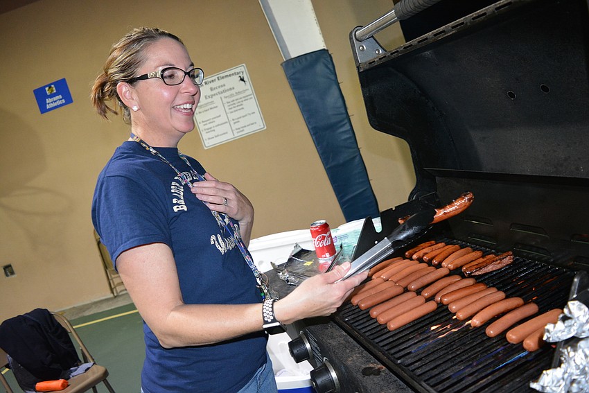 Fifth grade teacher Cortney Preston cooked up about 300 hot dogs with the help of her fellow fifth-grade teachers.