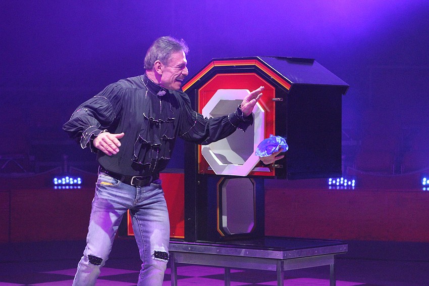 Rafael Palacios and Co-Chairwoman Donna Koffman's hand