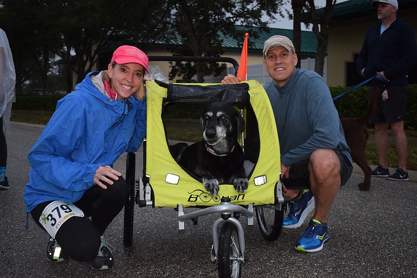 Lakewood Ranch's Pattie and Chris LeBanc walk in the 5K with their dog, Abby.