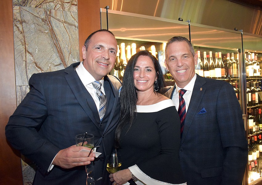 Lt. Rex Troche, Kelly Troche and Vicente Medina