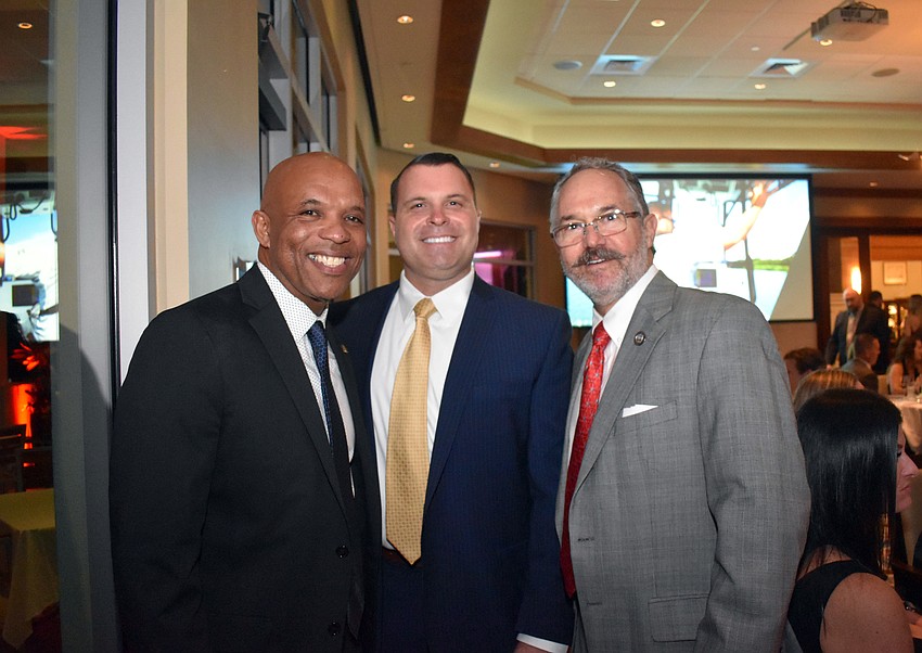 Marlon Brown, Pat Robinson and president Jeff Birnbach