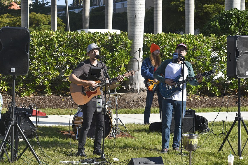The Billy Lyon Band plays along Gulfstream Avenue.