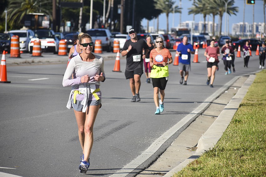 Karen Connolly-Lane runs down Gulfstream Avenue.