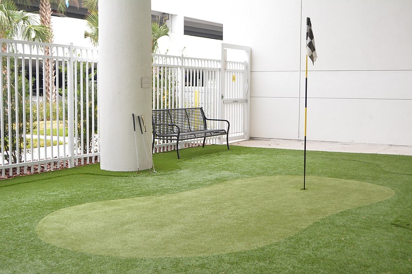 A putting green sits in the Rehabilitation Pavilion's 