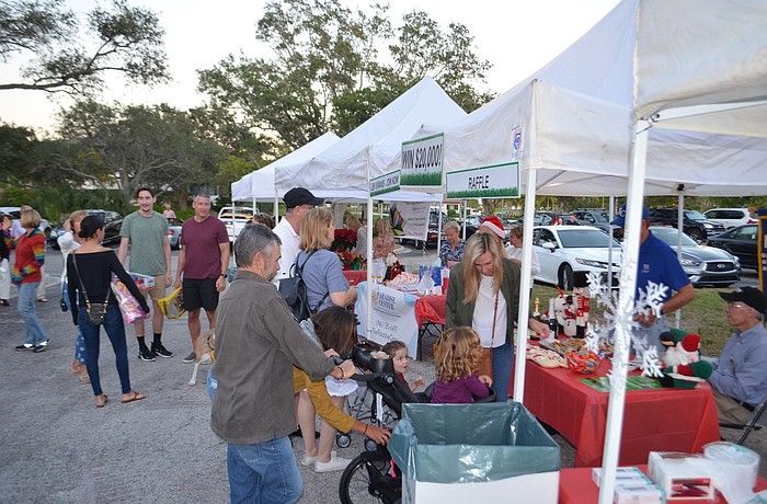 The town&#39;s tree-lighting ceremony was the first event held on the former Amore property.