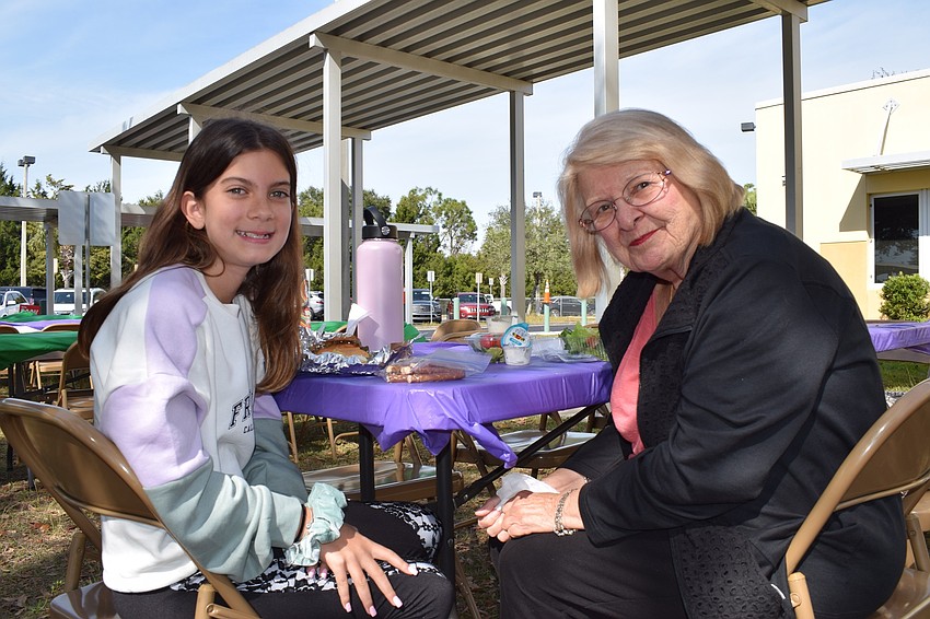 Abby Martin, a fifth grader, has lunch with her grandmother Illona Martin. 