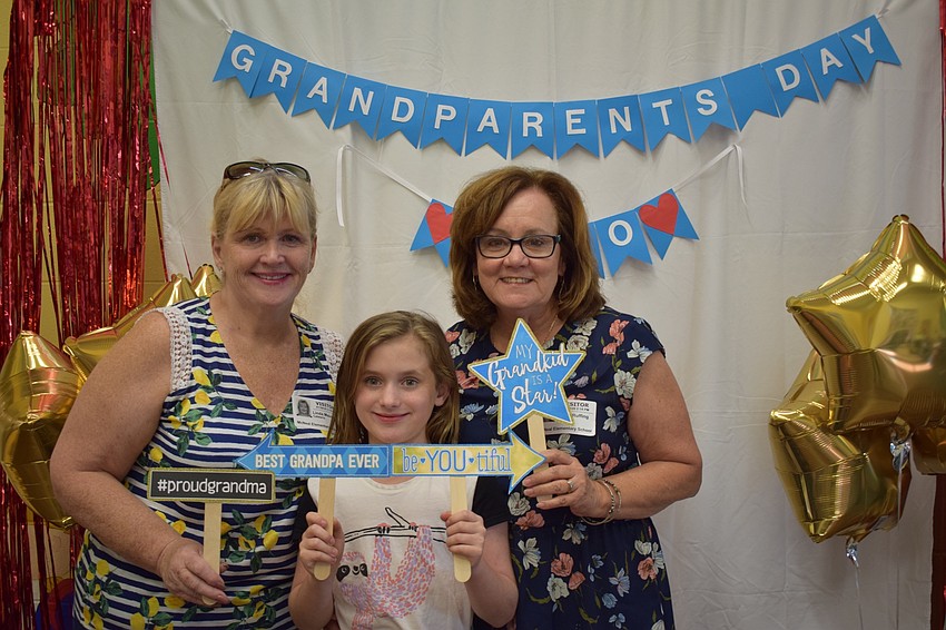 Linday Maughan spends time with her granddaughter Avery Ruffing, a third grader, and Ruffing's other grandmother, Maura Ruffing during Grandparents Day. 