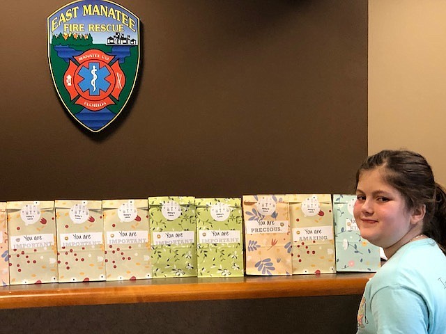 Abby Simpson delivers 61 goodie bags at the East Manatee Fire Rescue. Courtesy photo.