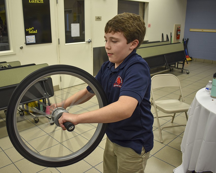 Tyler Paul, 10, gets the hang of the gyroscope.