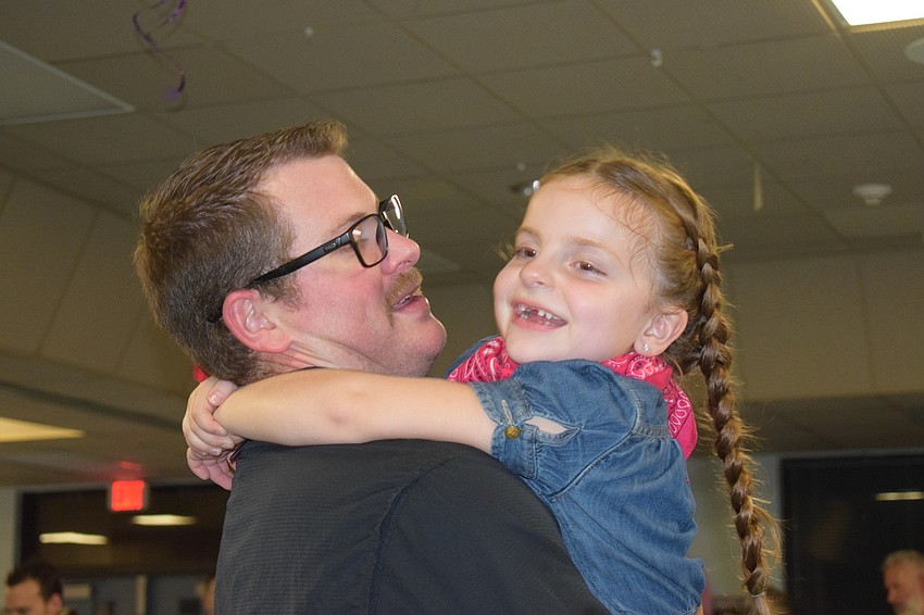 Mitch Conner spends quality time with his daughter Austin, a kindergartner, during the dance. This is the Conners second father-daughter dance.