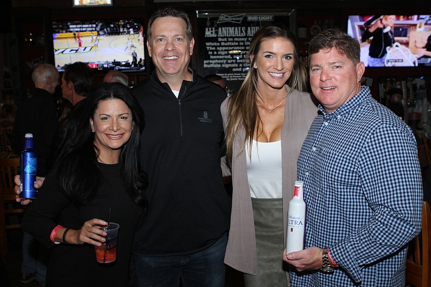 Maria and Ben Regoli with Kendra Moody and Board President Jack Cox