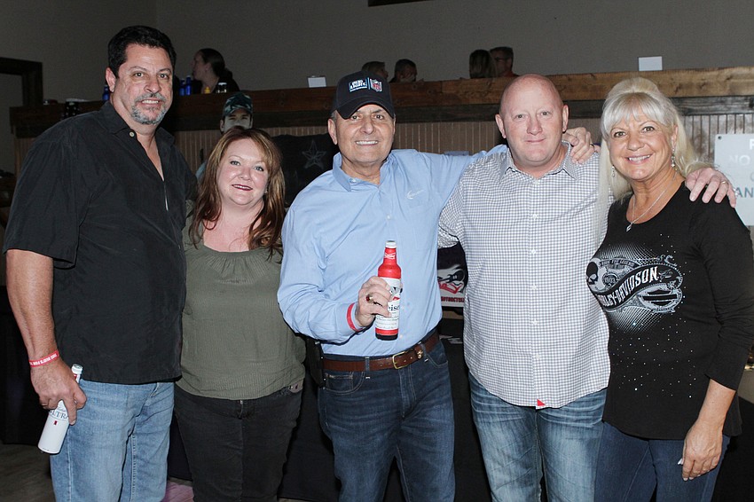 Joe and Amy Harris with John Saputo, Executive Director Lucy Nicandri and Pat Bruenning