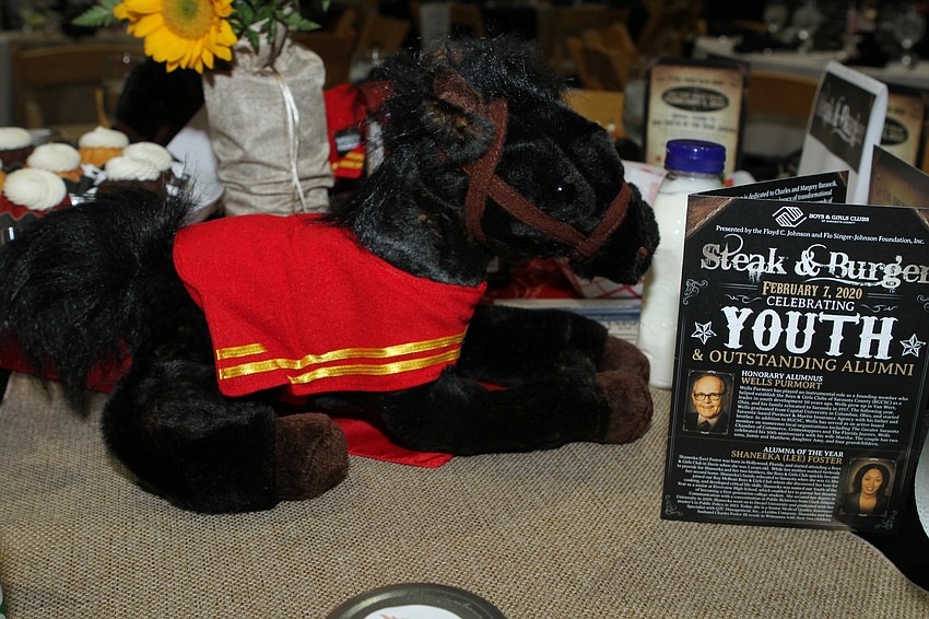 The night's western theme extended to the horse plushies adorning each table.