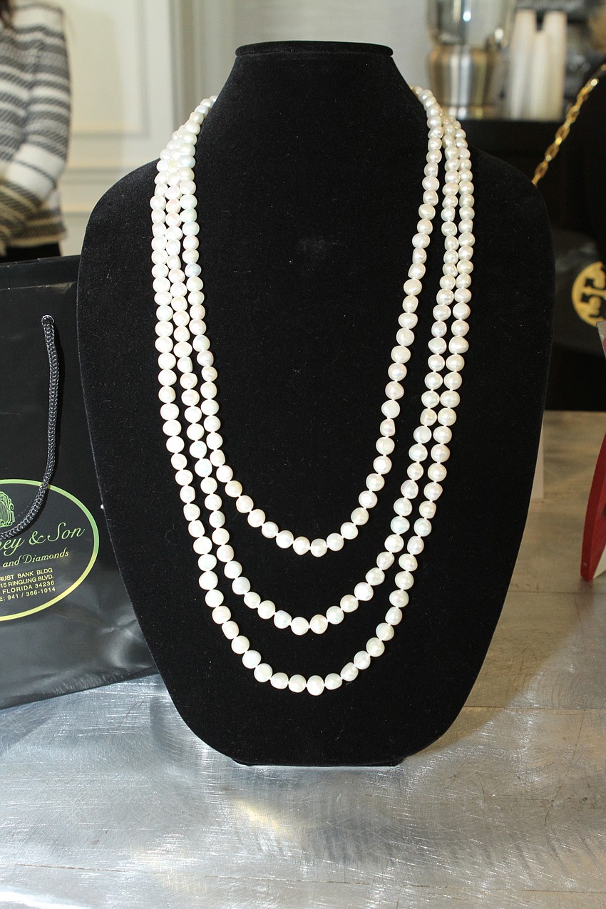 Guests bid on jewelry and other gifts at the silent auction.