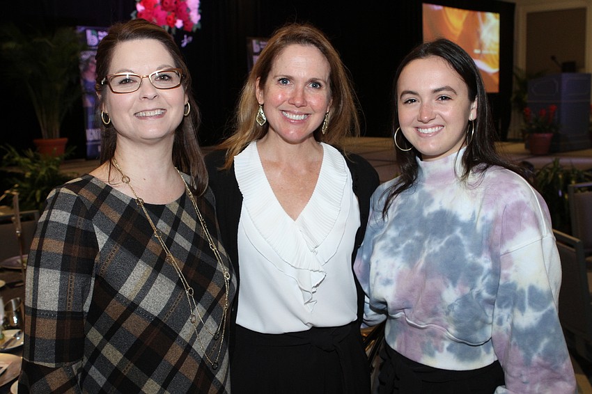 Melanie Johnston and Jeanne and Hannah Grill