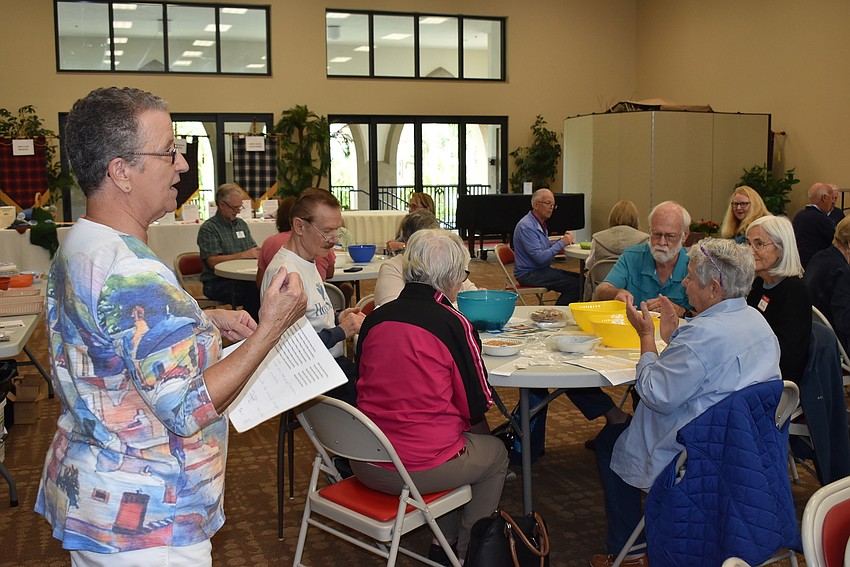 Ann Quackenbusch announces the total seeds packed on Feb. 7.