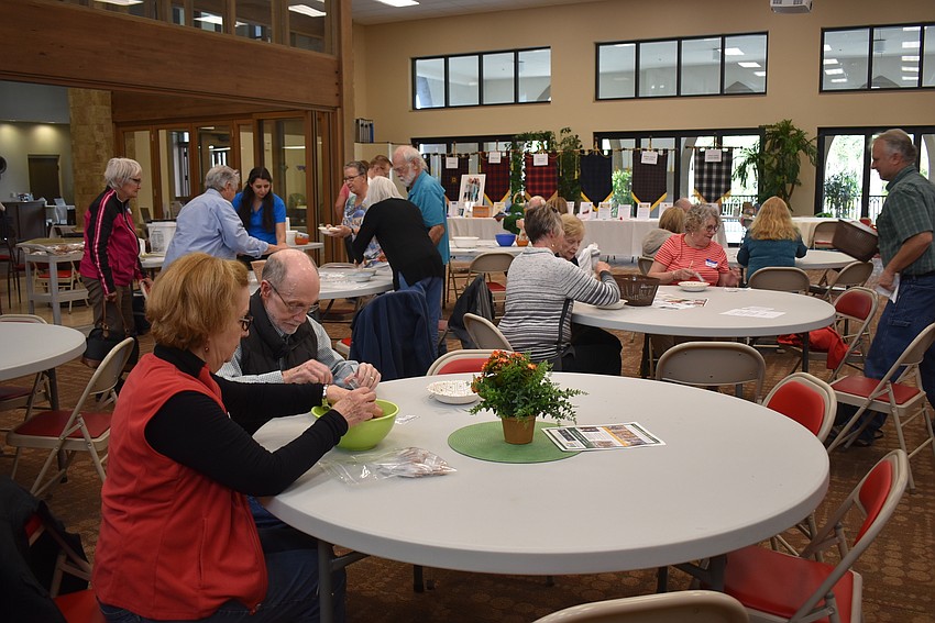 Some stayed to pack a few more bags as the event ended.
