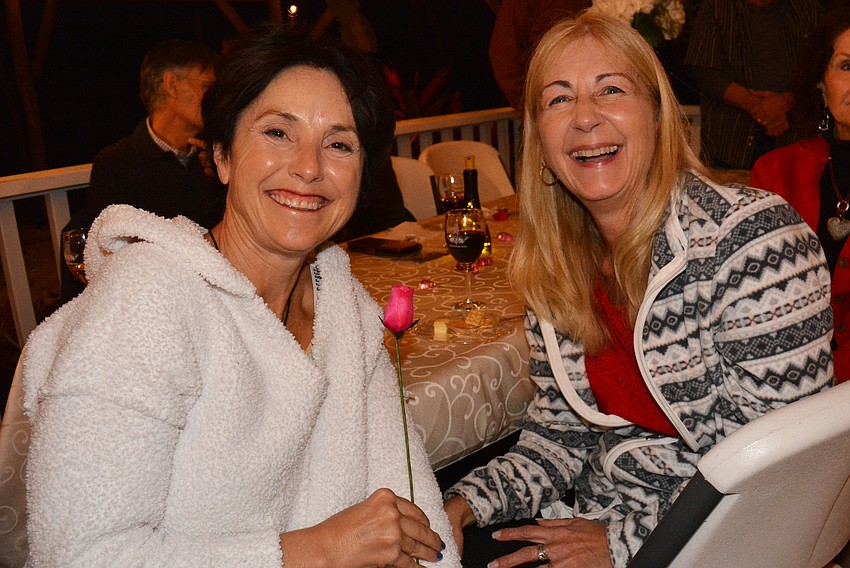 Sarasota's Yolande Lecoz and Lakewood Ranch's Maryann Gizzi met while watching adoptable dogs  be led across a red carpet.