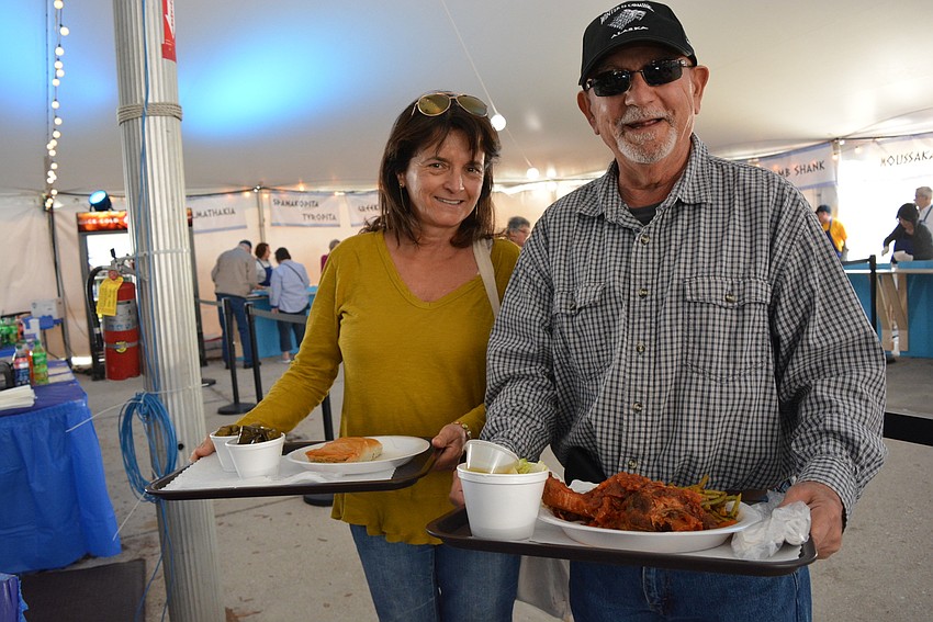 Palmetto's Patricia and Steve Cefalo were eager to eat their Greek feast, which included spanakopita and lamb shanks.