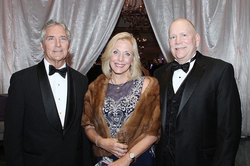 Phil Delaney with Michele and Rick Tromble