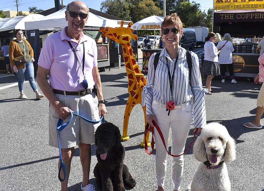 Jan Sirota and Alison Gardner with their dogs Izzy and Emma.