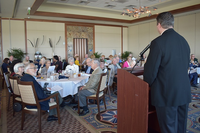 Father Dave Marshall addresses the crowd.