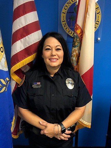 Volunteer reserve officer Kumiko Carter recently joined the Longboat Key Police Department. She thinks her role will entail anything from public relations to crime solving to community policing.