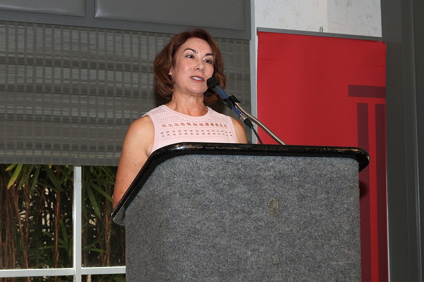 Chairwoman Brinda Pola started the luncheon's program.