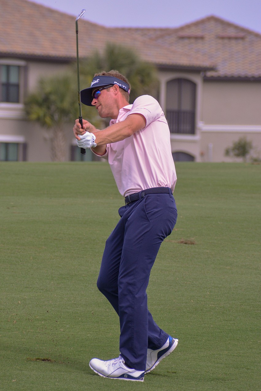 Tyson Alexander his his second shot on the No. 1 hole at Lakewood National. Alexander would par the hole and finish four under par on day one of the LECOM Suncoast Classic.
